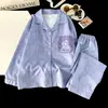 Conjunto de Pijama Masculino Primavera e Outono 2026 Novo Seda de Gelo Manga Longa Roupa de Casa para Meninos Médios e Grandes Fino Conjunto de Ar Condicionado