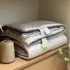 Edredón de plumón de ganso coreano para una persona, 100% algodón, lavable a máquina, para otoño e invierno, adecuado para dormitorios de estudiantes, edredón para personas perezosas de comercio exterior transfronterizo