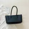 A popular bolsa de um ombro de 2026 deste ano para mulheres, bolsa tote casual versátil de grande capacidade para o verão