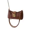 Moda Primavera 2025 Bolso Baguette Moderno y Personalizado Tendencia de Moda Diseño de Nicho Bolso de Hombro Cruzado con Textura para Mujer