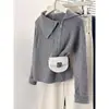 Cardigã de Tricô 2026 Outono/Inverno Feminino com Gola Reversível e Zíper Duplo, Design Único, Elegante e Sofisticado Casaco Suéter