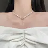 Collar de Perlas de Alta Gama Francés Camelia Lazo Doble Borla Cadena para Clavícula Vintage Todo Fósforo Cadena de Collar Exquisita