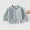 Nuevo estilo de cárdigan para bebé, prenda exterior de grado A para primavera y otoño, ropa versátil para niños y niñas, de manga larga, prenda exterior de color liso