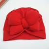 Gorro de bebé europeo y americano, gorro fetal con lazo, gorro indio para niños, gorro anudado de color liso, fabricantes indonesios.