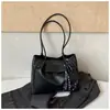 Bolsa Tote Retrô de Cor Sólida de Grande Capacidade para Comércio Exterior Feminina Outono 2026 Nova Elegante Bolsa de Ombro Único para o Trabalho Bolsa de Axila Tendência