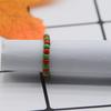 Versión coreana de pequeña y fresca Hyun-A con anillo de dedo índice de color anillo de cuentas de contraste anillo de cuentas tejido a mano