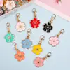 Colgante de Lazo de Aleación Flor de Cerezo Cierre Universal DIY Ropa Llavero Bolso Collar Pendiente Accesorios