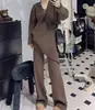 Conjunto Perezoso de Dos Piezas Estilo Francés Otoño e Invierno Comercio Exterior de Gama Alta Suéter Holgado Adelgazante de Cuello V Pantalones de Pierna Ancha Traje de Punto