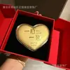 O Conjunto de Caixa de Presente Bolo Coração de Ouro de Coração Único da Shuibei é um Presente de Dia dos Namorados Chinês para Sua Namorada e Esposa