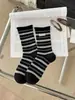 Calcetines de tela retro a rayas para otoño e invierno para mujer, hasta la pantorrilla, calcetines apilados con borde enrollado estilo coreano, versátiles, transpirables, cálidos, calcetines de moda