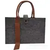 Bolsa de fieltro con cinta de cincha Suministro exclusivo transfronterizo Bolso de mano para regalo de oficina de negocios Bolso tote de cincha publicitario para exposiciones