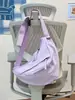Bolsa Casual de Lona de Nylon de Grande Capacidade Estilo Coreano para Mulheres 2026 Nova Bolsa Simples de Bolinho Versátil para Ombro e Transversal