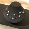 Europa y Estados Unidos collar de perlas de estrella transfronterizo diseño femenino sentido retro accesorios de collar cadena para la clavícula de alto sentido venta al por mayor