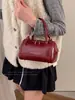 Bolso de Mano con Textura Retro Bolso Tote Pequeño para Mujer 2026 Primavera Nuevo Estilo Bolso Simple Tipo Almohada Bolso Cruzado con Cadena para Hombro