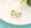 Productos de Venta Caliente Transfronterizos Europeos y Americanos, Suministro Directo de Fábrica, Pendientes Redondos de Circonita Cobre Plateado, Venta al por Mayor de Joyería Yiwu, Personalizable