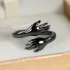 Deseo transfronterizo Pareja europea y americana Nuevo abrazo Anillo abierto Personalidad simple Anillo de nicho Venta al por mayor Entrega