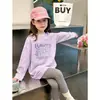 Camiseta de manga comprida para meninas 2026 primavera e outono nova estilosa camiseta básica de primavera infantil para crianças mais velhas, top de algodão puro com desenho