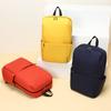 Mochila colorida al por mayor, mochila informal sencilla, mochila escolar informal para hombres y mujeres, mochila ligera
