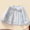 Nueva Camisa de Muñeca de Algodón Puro de Doble Botonadura Estilo Coreano para Niñas Primavera/Otoño Camisa Infantil Superior de Moda Casual Tendencia Ropa Infantil