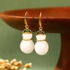 [Envío gratis] aretes clásicos de calabaza jade blanco simple aretes vintage temperamento s925 nicho aguja de plata al por mayor