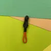 Venta al por mayor No. 3 Tiradores de Cremallera de Nylon, Accesorios de Cremallera para Trajes de Baño, Componentes de Cremallera para Uniformes Escolares, Tiradores de Cordón Coloridos para Ropa de Protección Solar