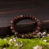 Suporta Pedidos Mistos de Novos Produtos: Joias de Mão, Pulseiras, Pulseiras de Contas Redondas para Exportação, Pulseiras de Contas com Pedra Ágata Café Imitação de Cor Escura de Cristal