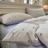 Nuevo juego de cuatro piezas jacquard teñido en hilo de alto peso, estilo simple y fresco, ropa de cama estilo princesa de lujo ligero
