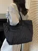 Bolso de Mujer de Gran Capacidad con Textura Única 2026 Primavera Nuevo Bolso Tote de Color Sólido en Relieve Bolso de Hombro de Moda para Mujer