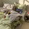 Juego de ropa de cama de cuatro piezas de algodón lavado estilo coreano, sábana bajera, protector de colchón, juego de tres piezas para dormitorio de estudiante, funda de edredón lavable a máquina