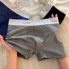 Cueca boxer esportiva respirável com color blocking de verão para homens, feita de seda de leite, cintura média com cós estampado, confortável e amiga da pele
