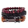 Pulsera tejida de cuero de vaca estilo retro simple europeo y americano pulsera de cuero de guitarra de aleación traje multicapa