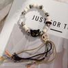 Pulsera de Cuerda Tejida de Gato Calavera para Hombres y Mujeres Diseño de Nicho Dulce y Genial Estilo Chino Pulsera de Color con Borla