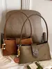 Bolso pequeño cuadrado de color sólido retro de alto valor para mujer, nuevo estilo de otoño 2026, bolso de mano de hombro moderno y elegante