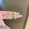 Pendientes de Plata Vintage Aguja Retro de Gama Alta Nicho Pendientes de Botón Moda Versátil Joyería para Orejas Venta al por Mayor