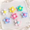 Accesorios de flor de resina de Margarita deformada en el borde, accesorios de flor diy, material diy para funda de teléfono móvil, girasol de resina, flor de cinco pétalos