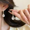 Aretes de perla y circonita para mujer, aretes con pasador de plata 925, diseño de nicho, aretes de alta gama y elegantes, suministro de fábrica al por mayor