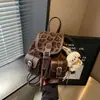 Mochila Vintage para Mujer 2026 Nuevo Modelo de Verano Lujo Ligero Gama Alta Estampado de Leopardo Versátil para Viajar de Commuting Múltiples Bolsillos Bolsa de Compras