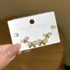 Set de Aretes Brillantes de Moño de Diamante de Tres Pares Exquisitos Personalidad Simple Aguja de Plata Chica Dulce Pequeños Aretes Versátiles