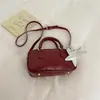Bolsa de Mão Retro para o Dia a Dia Bolsa de Boliche para Mulheres 2026 Verão Nova Simples Estilo Coreano de Alto Valor Bolsa de Ombro Único Transversal