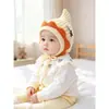 Bonito gorro de lana tejido para bebés en otoño e invierno, unisex, con protección para las orejas y características a prueba de viento, adecuado para niños pequeños como gorro de invierno