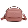 Bolsas Casuais para Mulheres 2025 Novo Estilo Bolsa de Mão Versátil Bolsa de Mãe Bolsa de Celular Multicamadas Bolsa de Ombro Transversal de Tecido Oxford