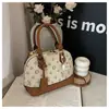 Bolsa Feminina de Luxo Estilo Chanel 2026 Novo Modelo Bordado Matelassê Bolsa de Corrente Bolsa Saco com Cordão Bolsa de Ombro Único Transversal