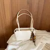 Bolso de cuero aceitado de alta gama para mujer, nuevo modelo 2026, bolso decorativo, bolso de hombro y axila a la moda, bolso versátil para el trabajo diario para mujeres, comercio exterior
