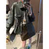 Falda Corta de Cuero PU Estilo Moderno para Viajar Petite de Cintura Alta que Cubre la Cadera Adelgazante Temperamento MQ2004
