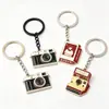 Llavero de metal de dibujos animados personalizado, colgante de llave de cámara esmaltado electrochapado fundido a presión, regalo cultural y creativo, llavero para parejas