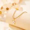 Accesorios de collar de flor de cinco pétalos transfronterizos de Amazon para mujer, cadena de clavícula con colgante elegante de lujo ligero de nicho, venta al por mayor