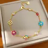 Pulsera de flor con incrustaciones de diamantes chapada en oro real de 18k, pulsera de nicho de lujo ligero, accesorio de vacaciones de estilo dulce colorido para mujer