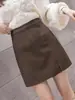 Falda de piel sintética para mujer, nueva moda otoño/invierno 2026, de cintura alta, adelgazante, falda versátil de línea A