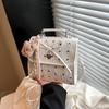 Bolsa Pequena de Bolinhas com Laço para Mulheres 2025 Nova Moda Design Seersucker Verão Nicho Comutador Bolsa de Ombro