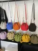 Bolso bandolera de hombro único de estilo coreano para comercio exterior, bolso de cubo fresco con cordón para mujer, bolso de hombro pequeño casual de nailon texturizado transfronterizo
